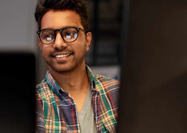 smiling man with glasses