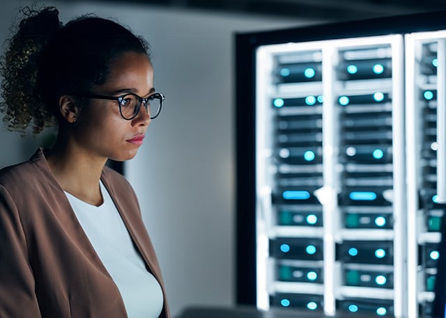 A woman in a server room