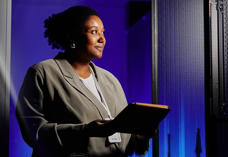 Woman with a laptop using Certificate Manager